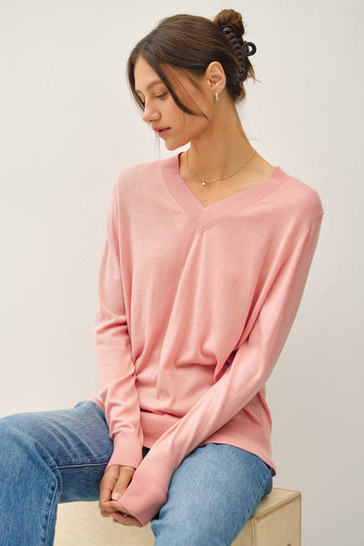 thin pink sweater